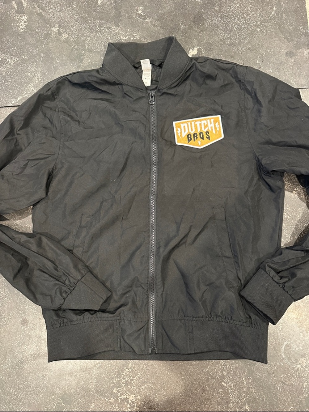 Dutch Bros Black Bomber Jacket with Gold Patch
